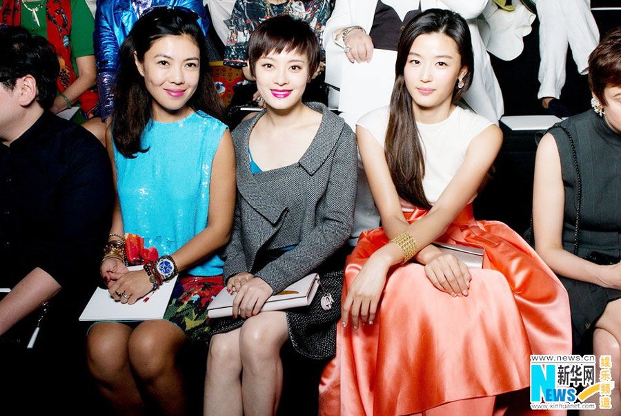Sun Li watches fashion show in Paris