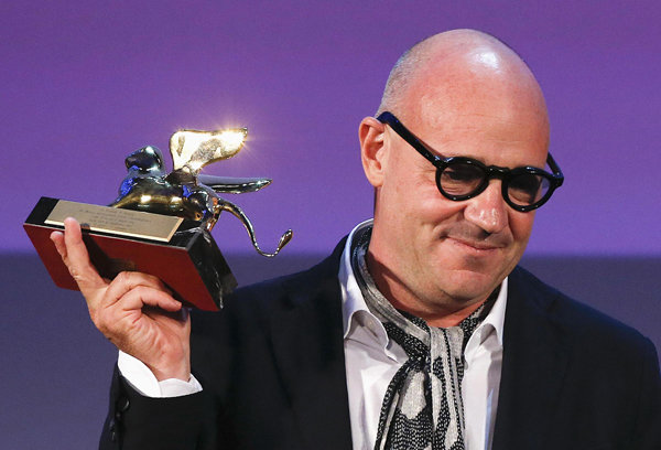Italian director Gianfranco Rosi wins Golden Lion Award