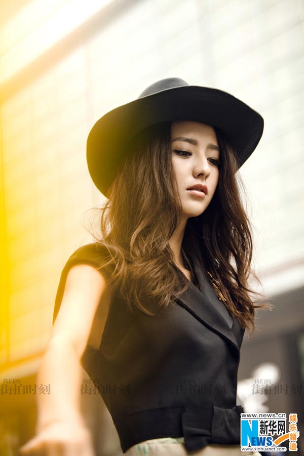 Chinese actress Tong Liya spells elegance in street snapshots