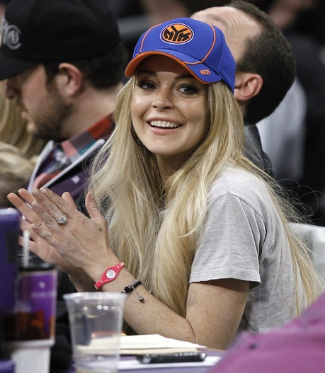 Lindsay Lohan attends the NBA basketball game