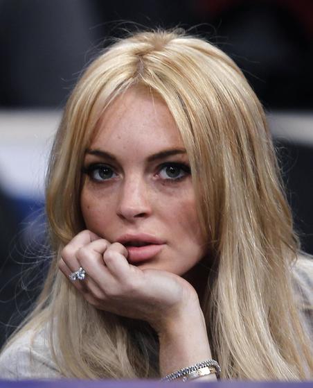 Lindsay Lohan attends the NBA basketball game