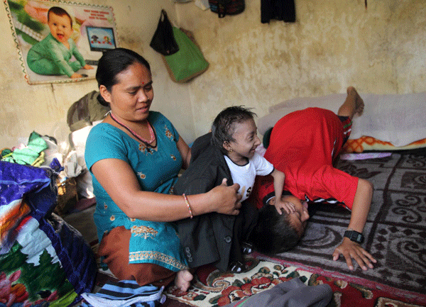 Nepal teen stands tall as world's shortest man