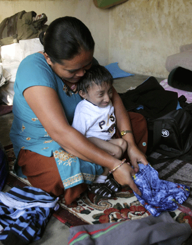 Nepal teen stands tall as world's shortest man