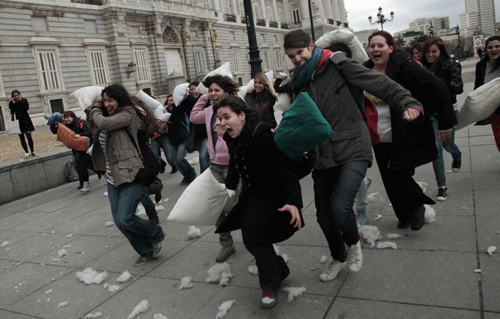 Pillow fight outside Madrid's Royal Palace