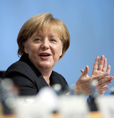 Merkel urges 'more Europe' to overcome debt crisis