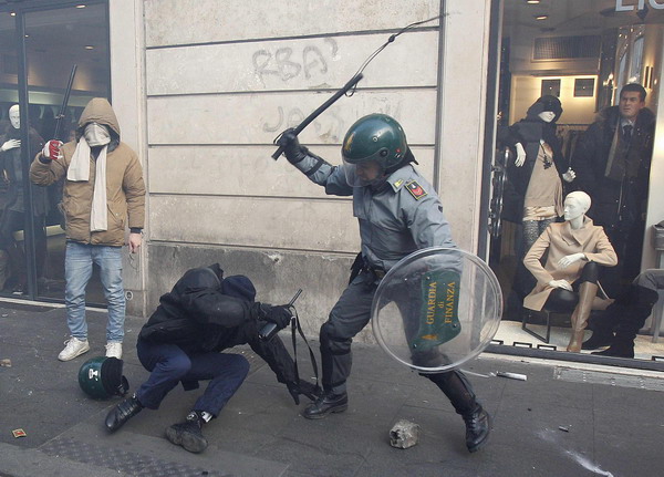 Riots in Rome as Berlusconi survives vote