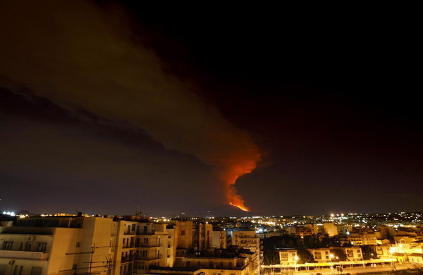 Mount Etna spews lava