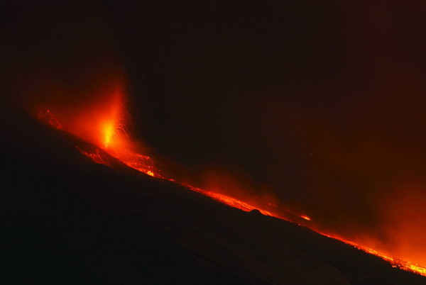 Mount Etna spews lava