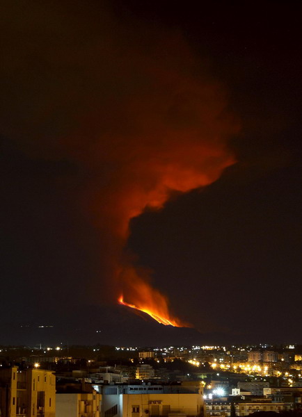 Mount Etna spews lava