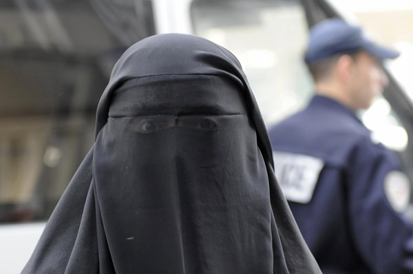 France bans full face veils, spurring protests