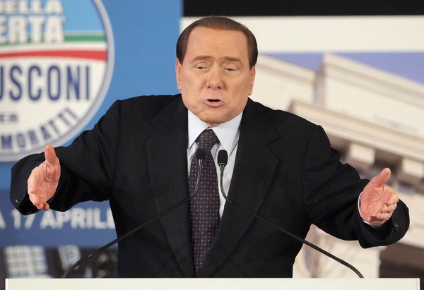 Dominant Berlusconi unbowed by trials