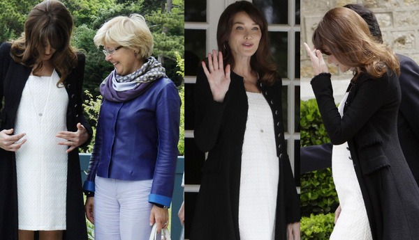 France's Carla Bruni shows off bump at G8 summit