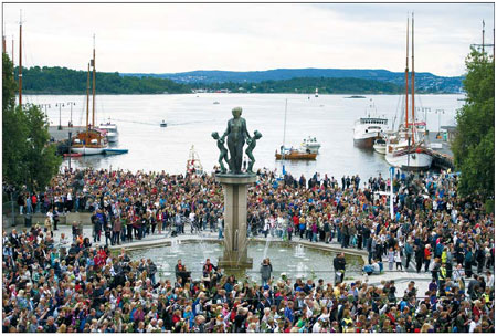 150,000 throng Oslo flower vigil for attacks