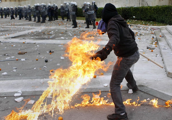 Greek police fire tear gas at protesters in Athens