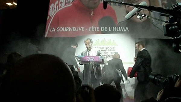 France's election frontrunner hit by flour bomb
