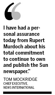 British police arrest five at Murdoch's Sun newspaper