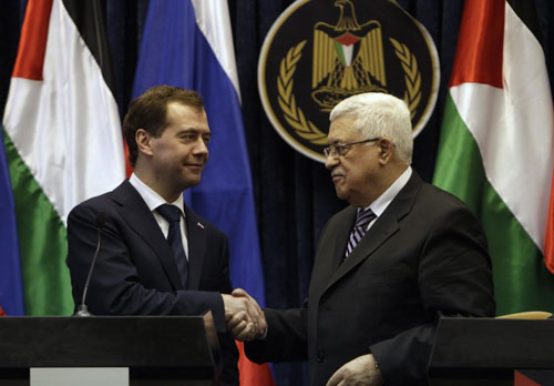 Palestinian, Russian leaders urge settlement freeze to resume negotiations
