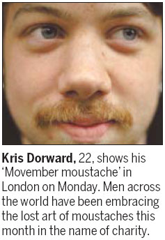 Men keep moustaches for charity