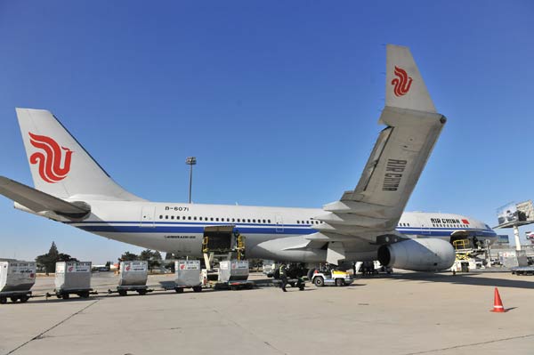 Smiling German enjoys high life with Air China