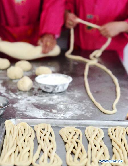 People make traditional food 