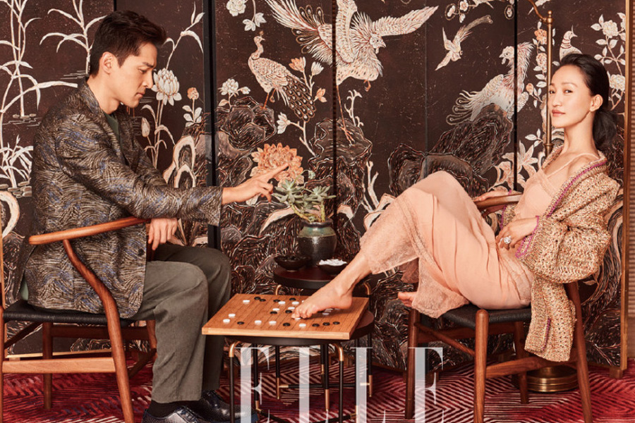 Zhou Xun and Hu Ge pose for fashion magazine