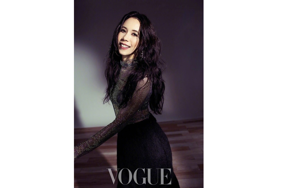 HK pop queen Karen Mok poses for fashion magazine