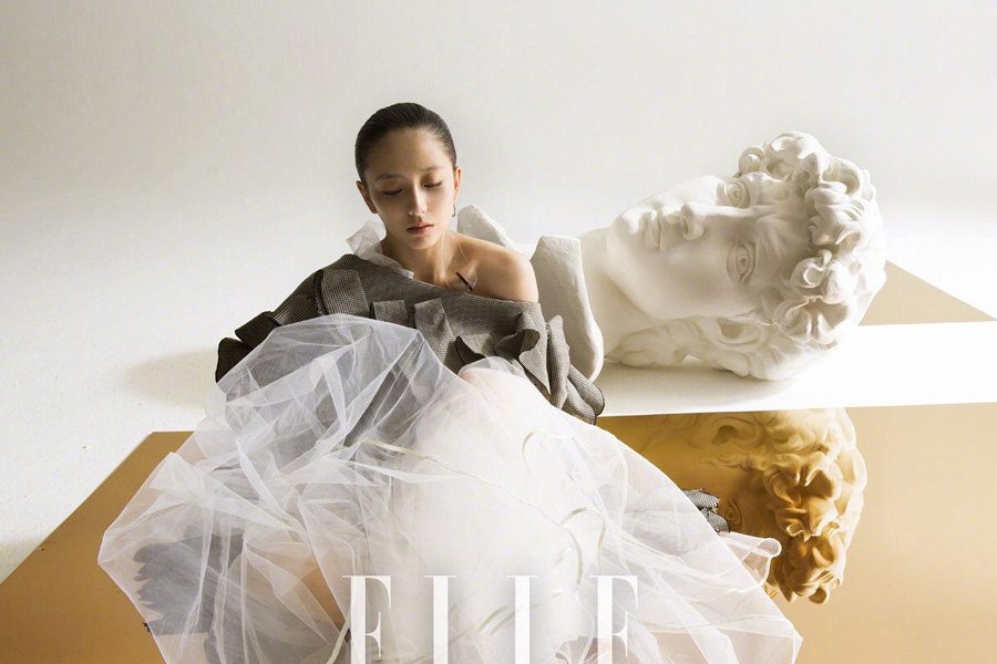 Chinese actress Tong Liya poses for fashion magazine
