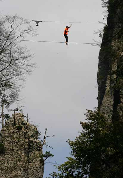 American walks 200m-high tightrope