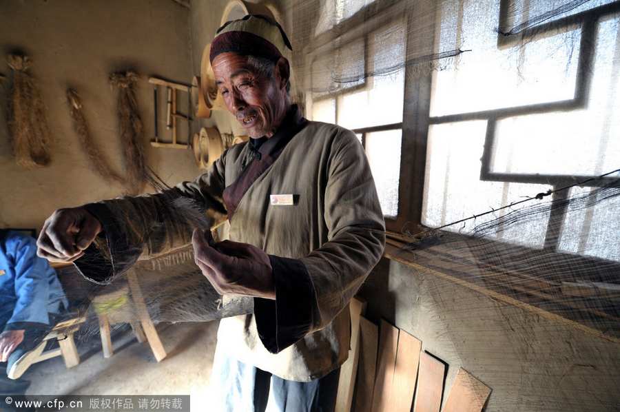 Chen Jianhua, a craftsman, makes a flour sifter at his shop in China West Film Studio, Ningxia Hui autonomous region, on March 16, 2012. Making flour sifter now a craft of the past
