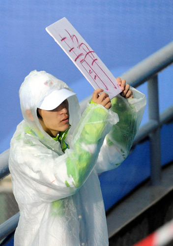 Volunteers brave the rain for Games