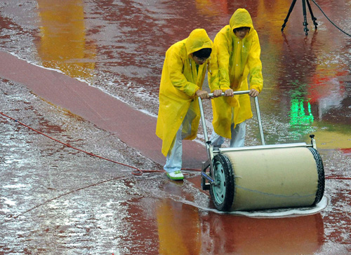 Volunteers brave the rain for Games