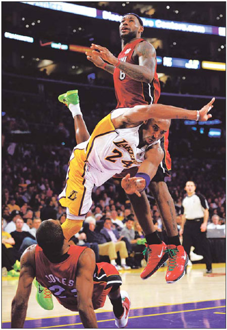 LeBron has a triple-double, Heat routs Lakers