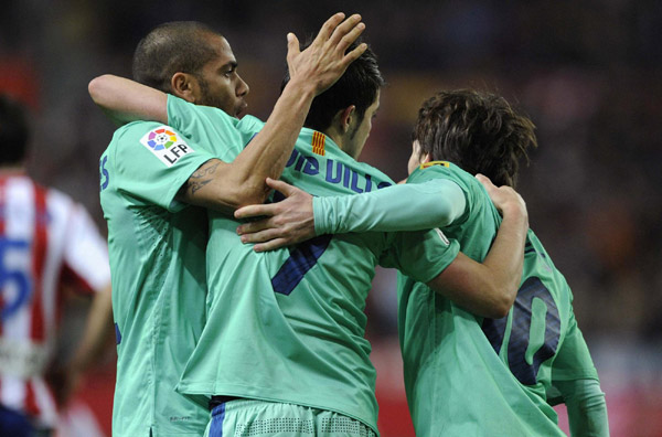 Barcelona's winning run ends in Gijon