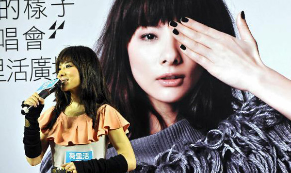 Gymnast-turned-singer promotes new album in HK