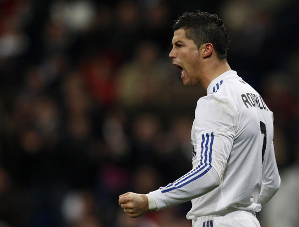 Hat-tricked Ronaldo on song as Real thrash Malaga 7-0