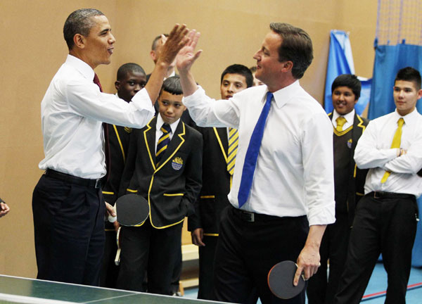 Obama, Cameron team up as table tennis partners