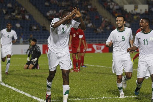 China, Saudis through in World Cup qualifying