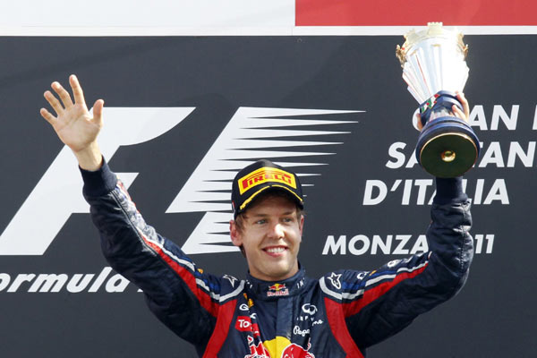 Vettel has a hand on title after Italy win