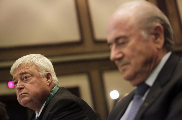FIFA's President Joseph Blatter (R) and Brazilian soccer Confederation (CBF) President Ricardo Teixeira attend the Team Seminar in Rio de Janeiro July 29, 2011. Critics want red card for Brazil's football boss