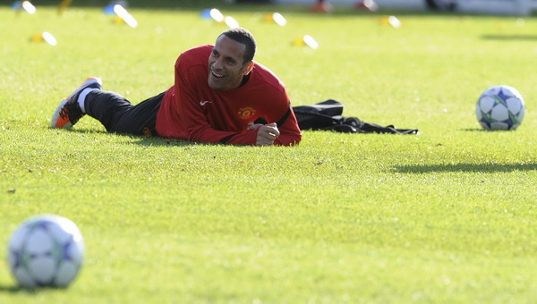 Manchester United's Rio Ferdinand reacts during a training session at the club's Carrington training complex in Manchester, northern England Nov 1, 2011. Under-pressure Ferdinand starts against Galati
