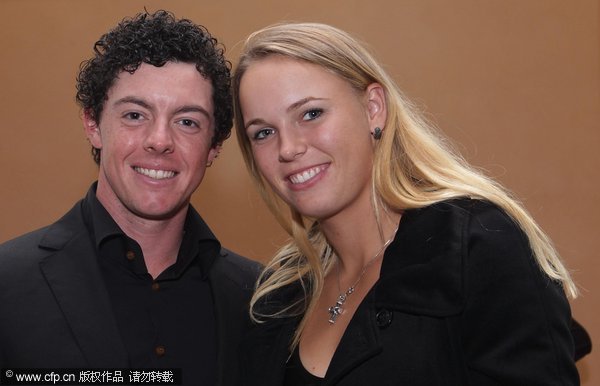 World No 1 Wozniacki roots for golfer boyfriend