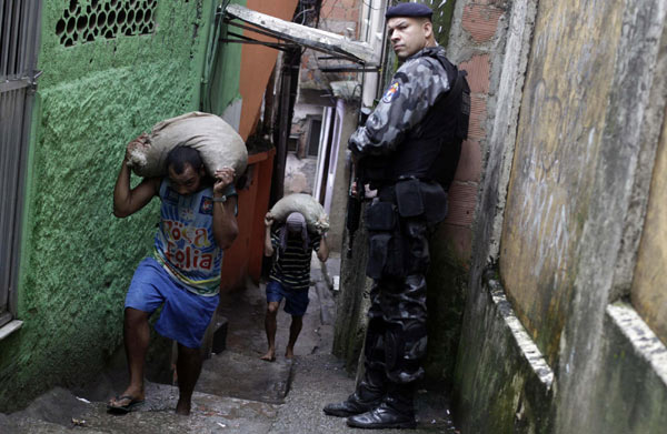 The Brazilian government said Sunday that police have taken control of two slums in southern Rio de Janeiro without resistance from drug dealers. Brazil takes hold of two slums from drug traffickers
