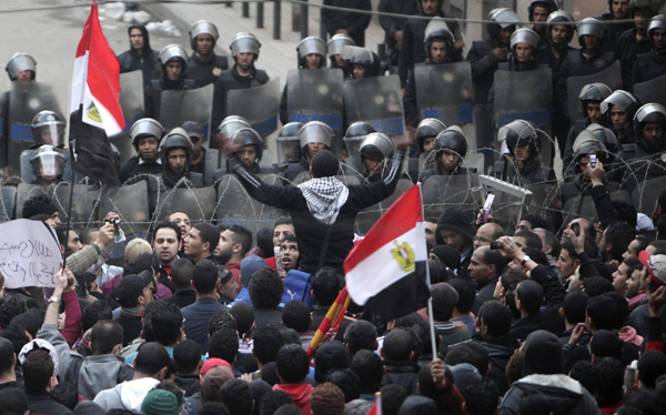 Egypt probes deadly soccer riot amid new protests