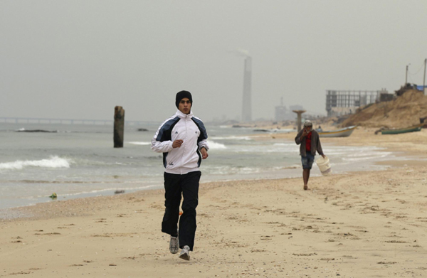 Gaza runner Bahaa al-Farra treads carefully, braving the elements and potholed roads ravaged by years of conflict between Palestinian militants and the Israeli army, as he prepares to race at the London Olympics. Gaza runner ready to fly Palestinian flag in London