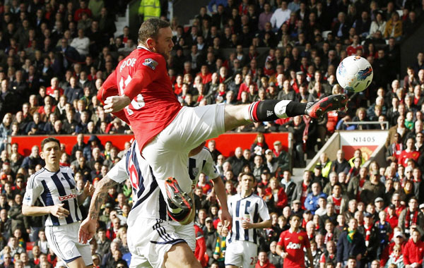 Two goals from Wayne Rooney put Manchester United back on top of the Premier League for the first time in five months when they beat West Bromwich Albion 2-0 at Old Trafford. Rooney goals lift Man United top after City loses