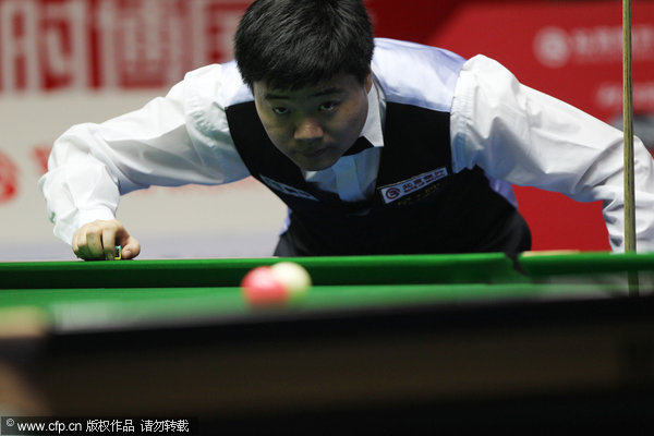 Ding rallies to beat Woollaston in China Open