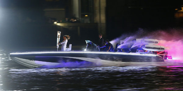 Seven teenagers light Olympic cauldron