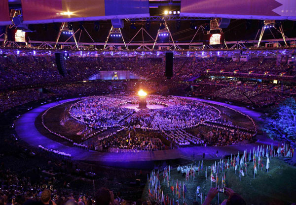 Seven teenagers light Olympic cauldron