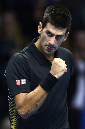 Djokovic fights back to beat Murray at Tour Finals