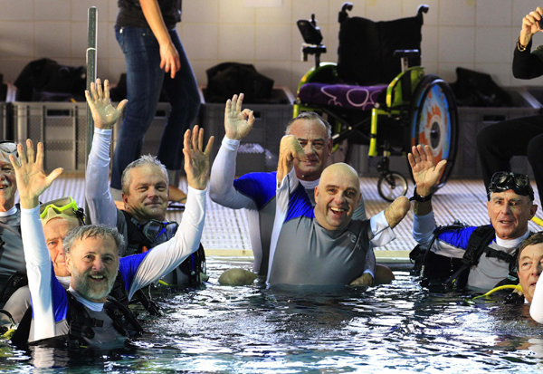 Disabled diver breaks record at 33 meters